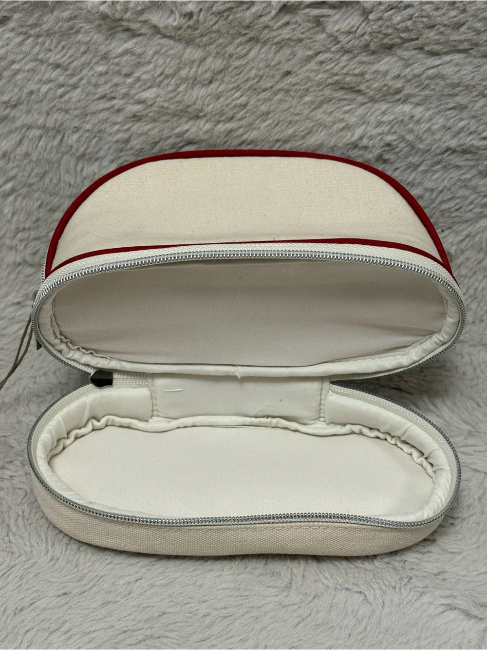 a new day Cream Cosmetic Pouch with Red Trim